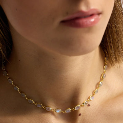 The Luna Moonstone Gold Chain Necklace is a sustainable necklace to keep for every season. On a recycled 18k gold chain, this features stunning vintage gemstones that&nbsp;may be worn as a chocker or extended to a longer version.