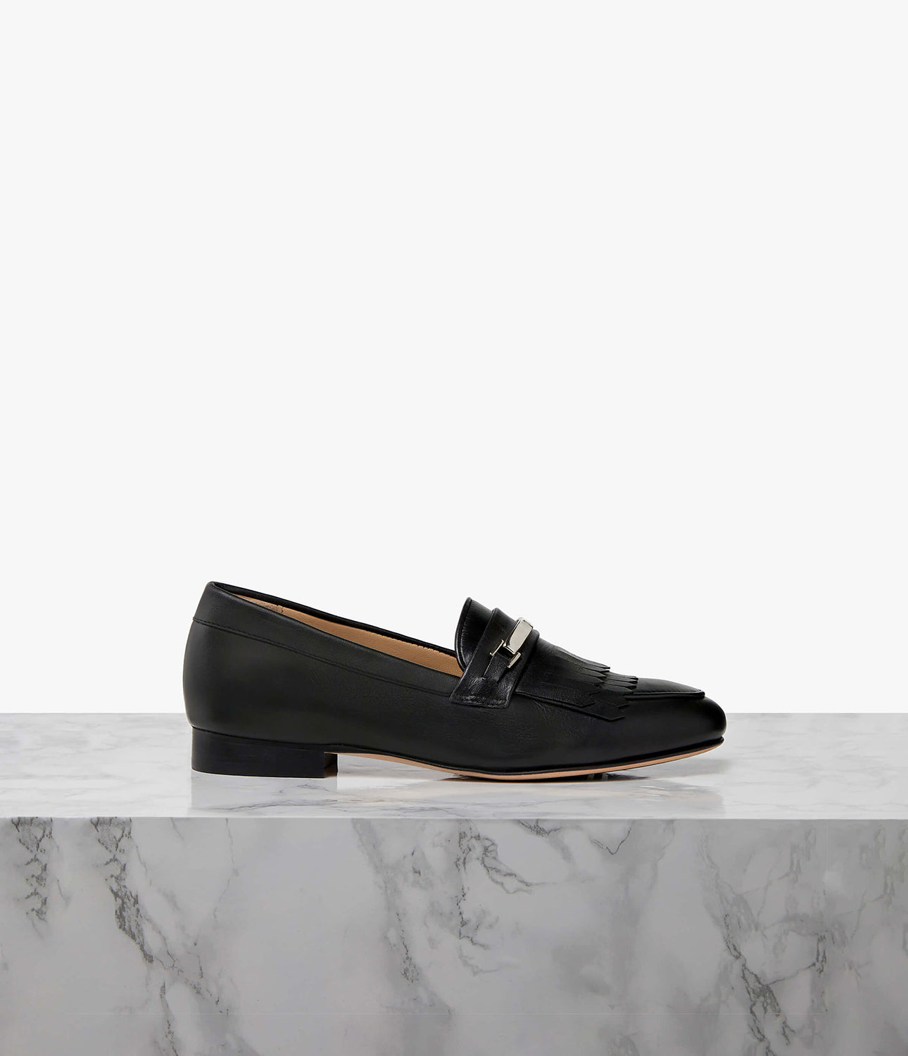 Crafted from supple leathers, our Elan loafer adds a feminine twist to the timeless loafer design. A signature Each x Every insole ensures a supportive glove-like fit, while the modern almond toe easily transitions from day-to-night wear. Androgynous yet elegant, the Elan is available either plan or with a tassel fringe and metal trim to smarten your mid-week and weekend wardrobe.