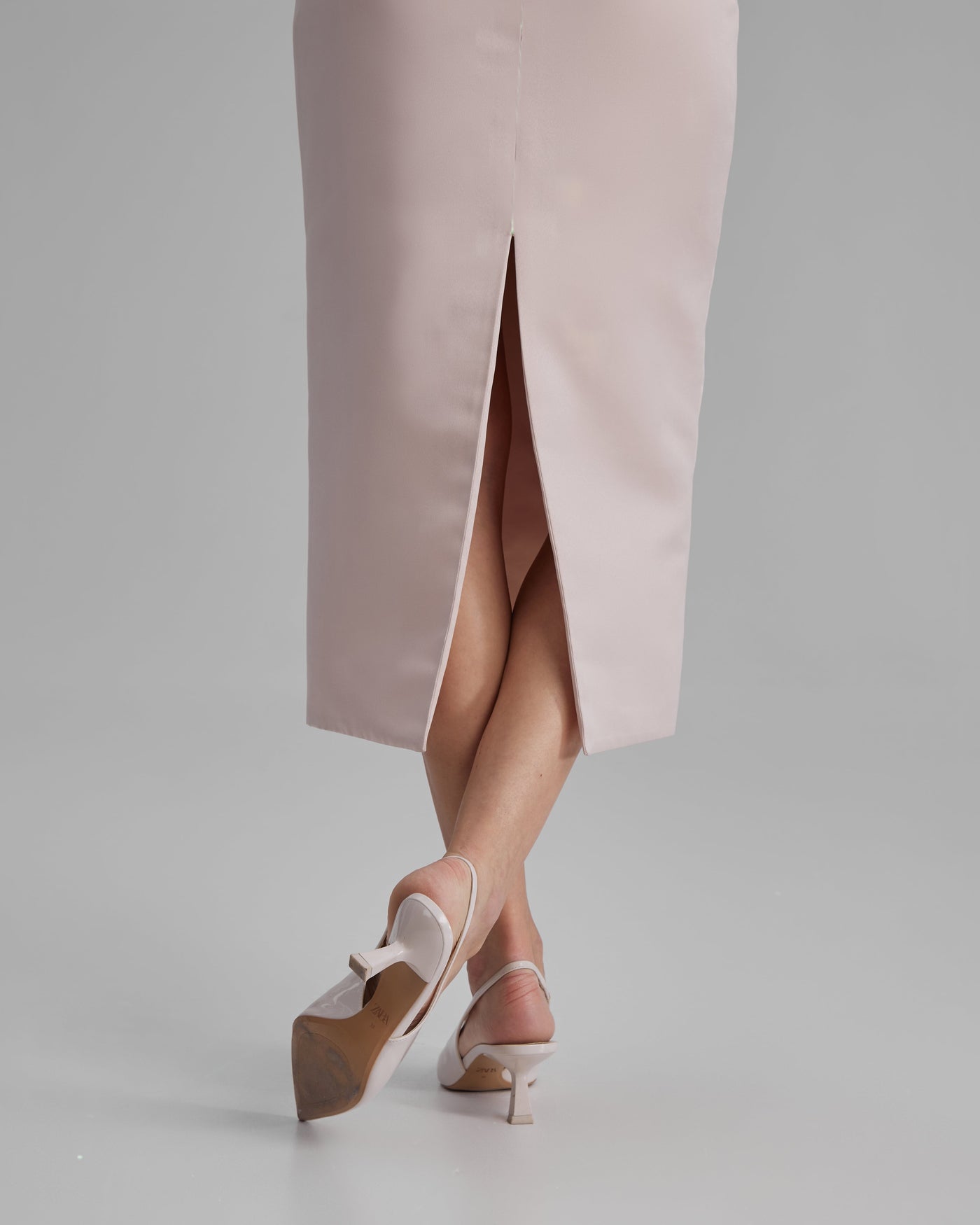 KIRA DRESS | strapless pencil midi in apricot pink