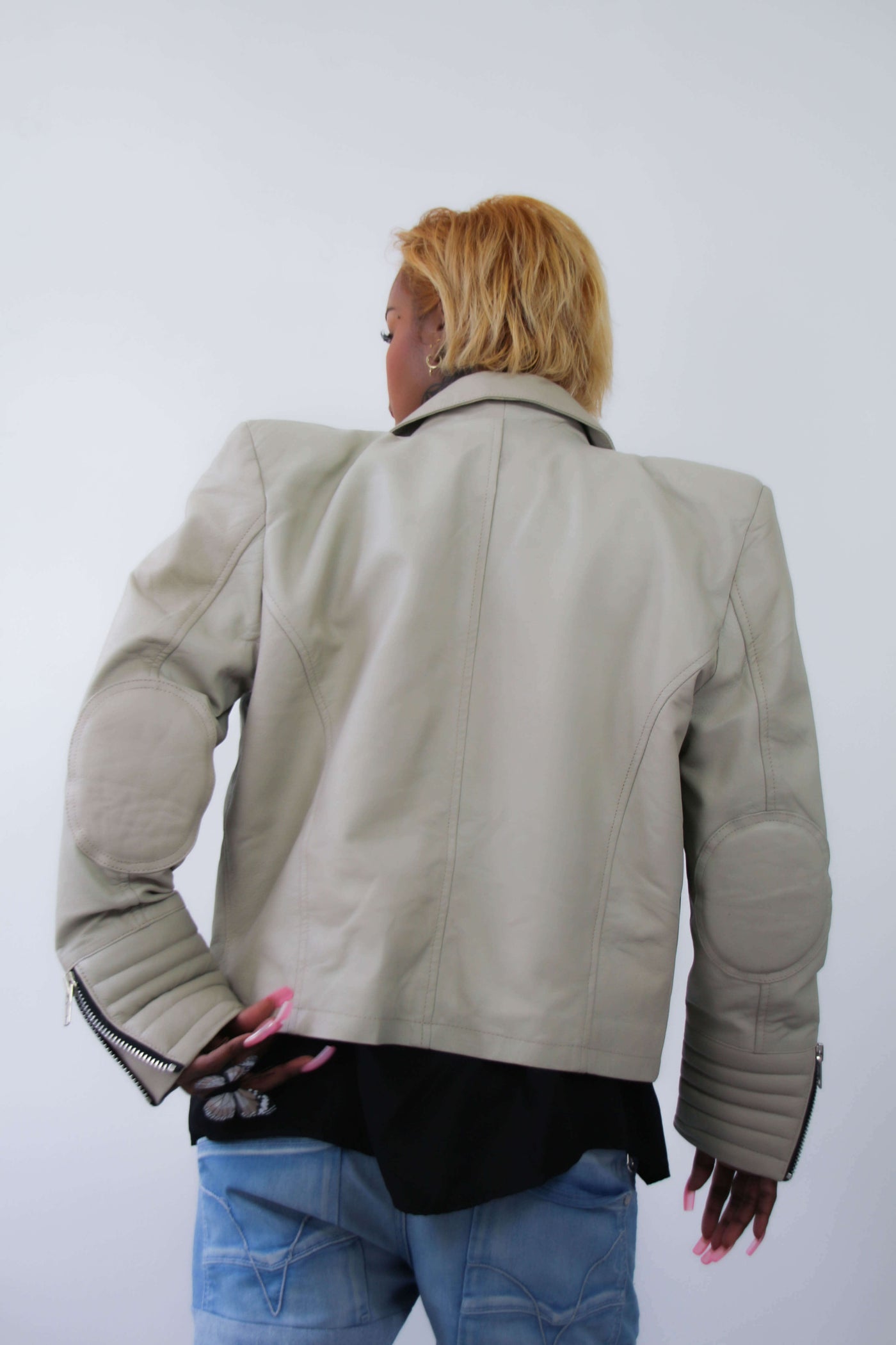 Leather jacket with exaggerated shoulders- short